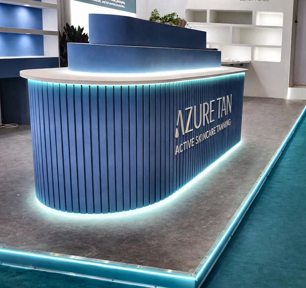 Reception counter on the Azure Tan stand — Cosmoprof, Bologna
